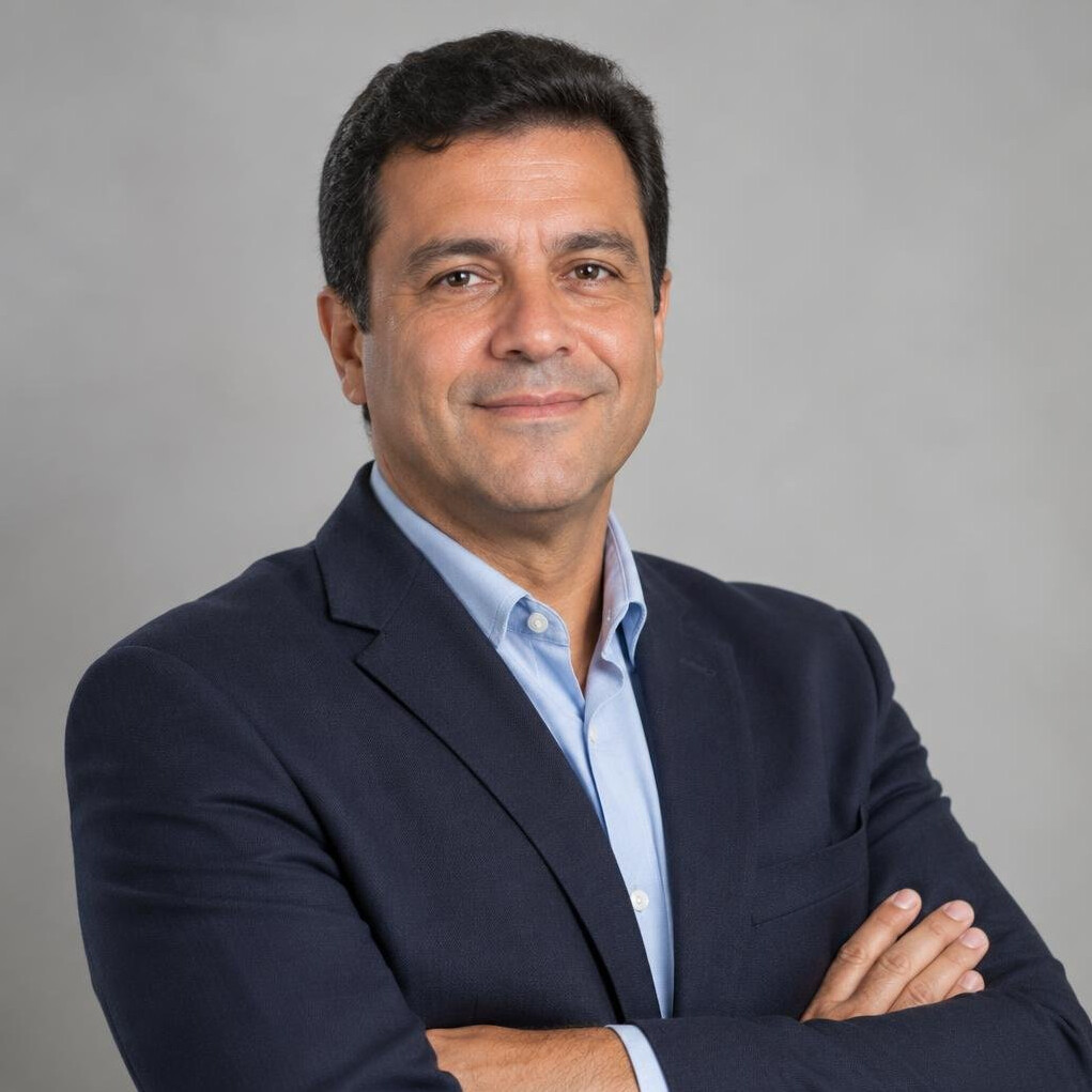 Portrait of a calm confident Brazilian man in business casual clothing